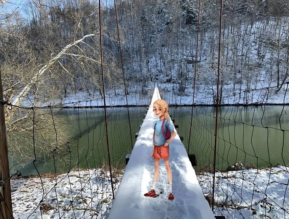 Virginia is for Adventures picture with character meg on Clinchport Swinging Bridge